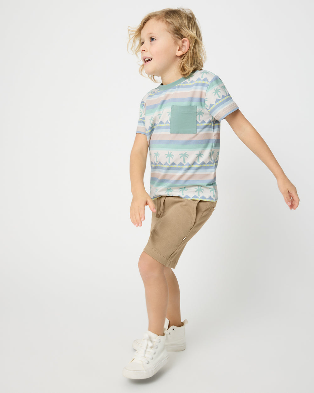 Boy wearing the Swell Stripes Relaxed Pocket Tee with Toasted Hazelnut Boys Shorts