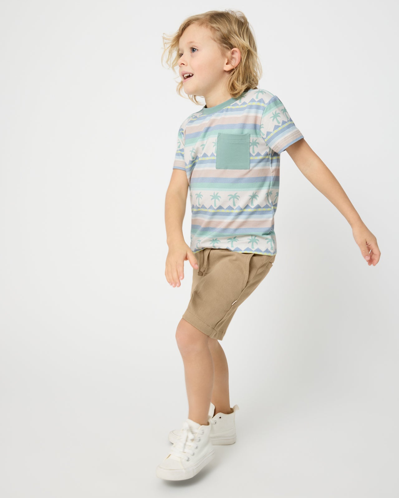 Boy wearing the Swell Stripes Relaxed Pocket Tee with Toasted Hazelnut Boys Shorts