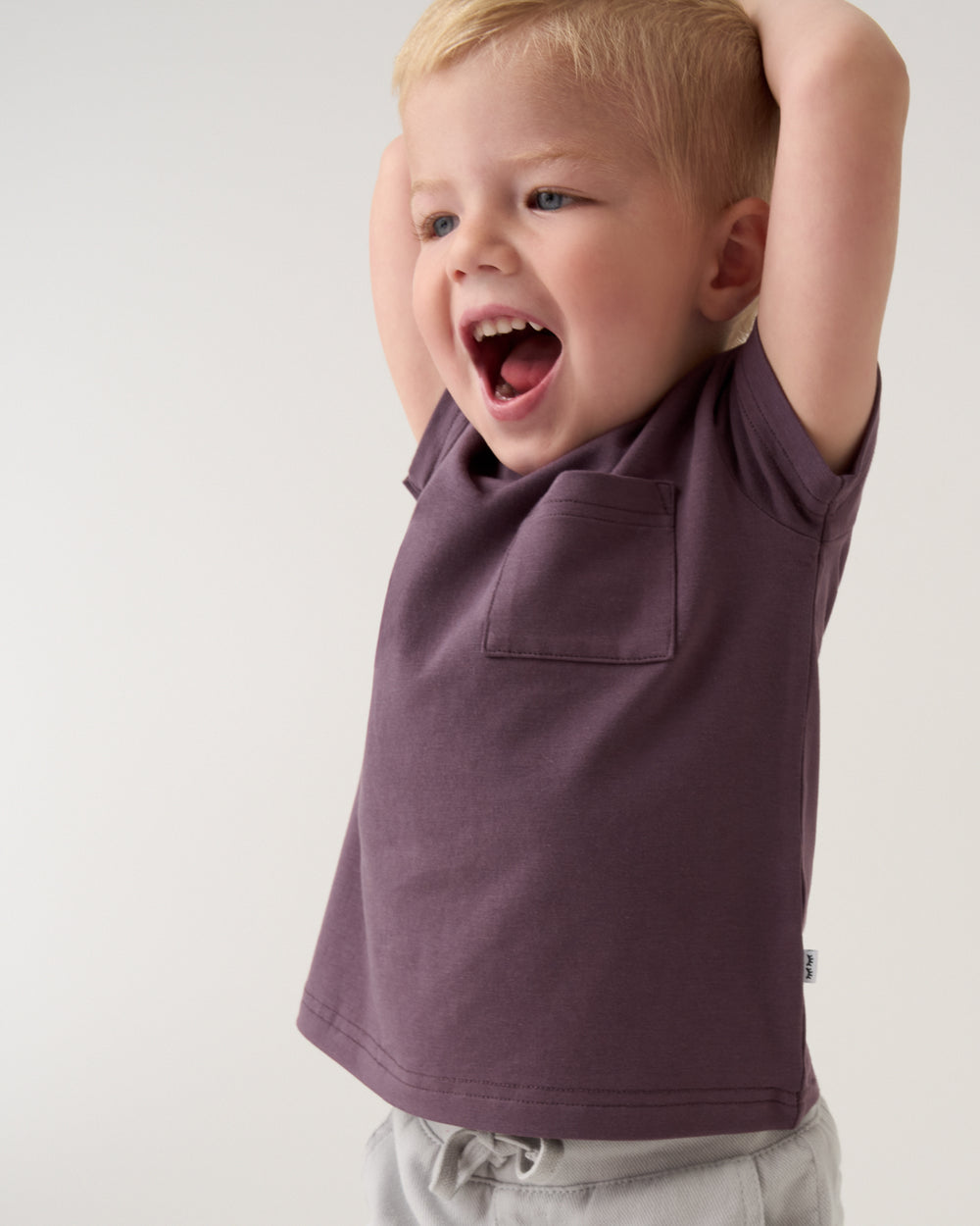 Boy wearing the Vintage Plum Relaxed Pocket Tee