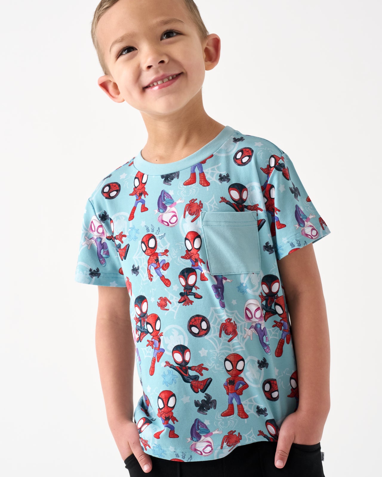 Boy wearing the Spidey & Friends Tiny Webs Relaxed Pocket Tee