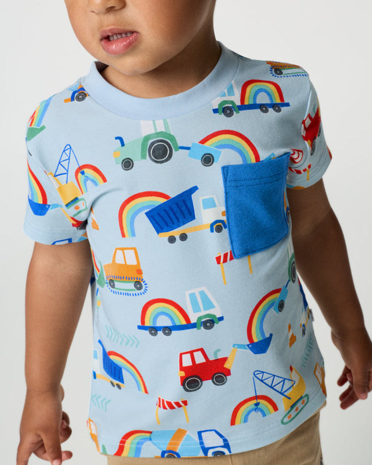 Close up of boy wearing the Rainbow Trucks Relaxed Pocket Tee