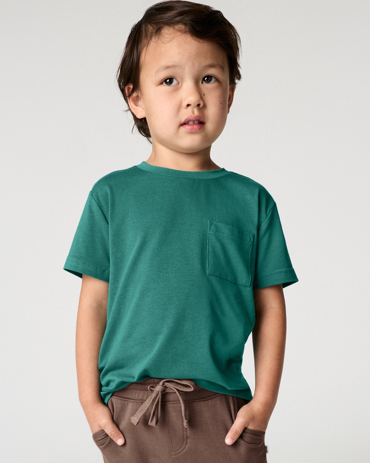 Boy wearing the Emerald Isle Relaxed Pocket Tee