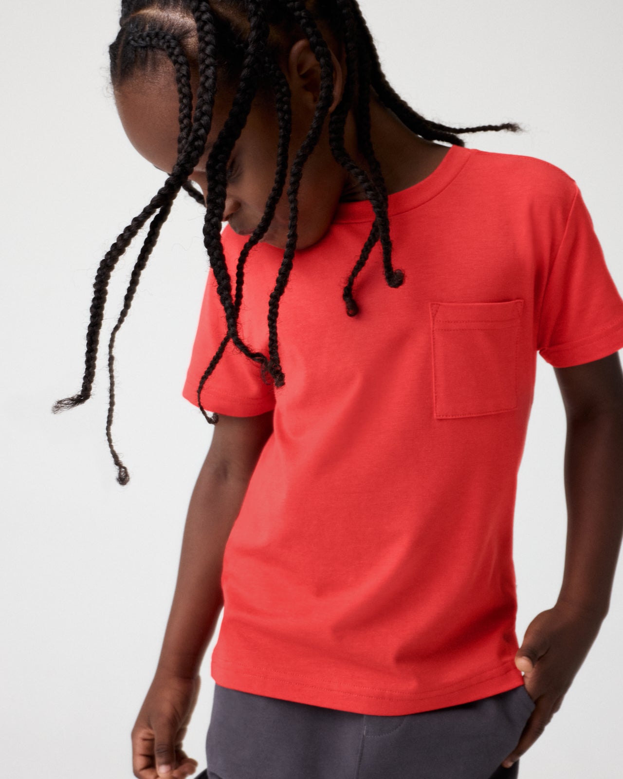 Boy wearing the Red Ember Relaxed Pocket Tee