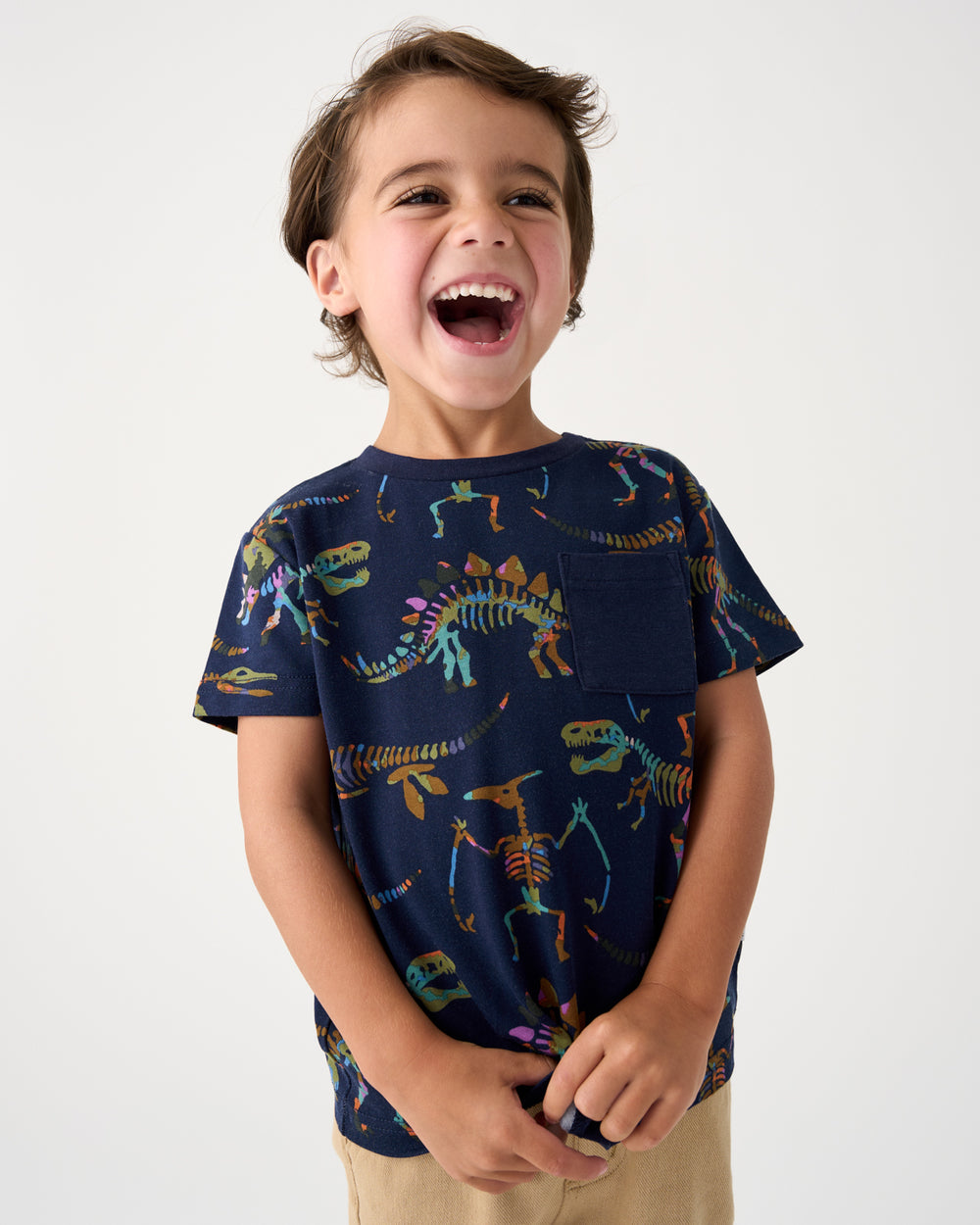 Close up of boy wearing the Fossil Quest Relaxed Pocket Tee