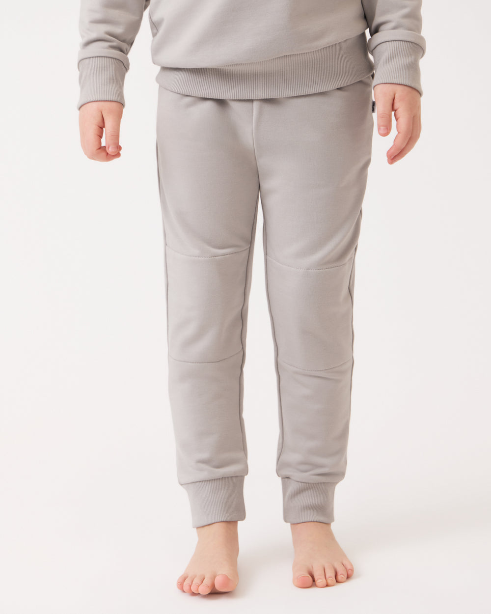 Close up of child wearing the Dove Gray Jogger