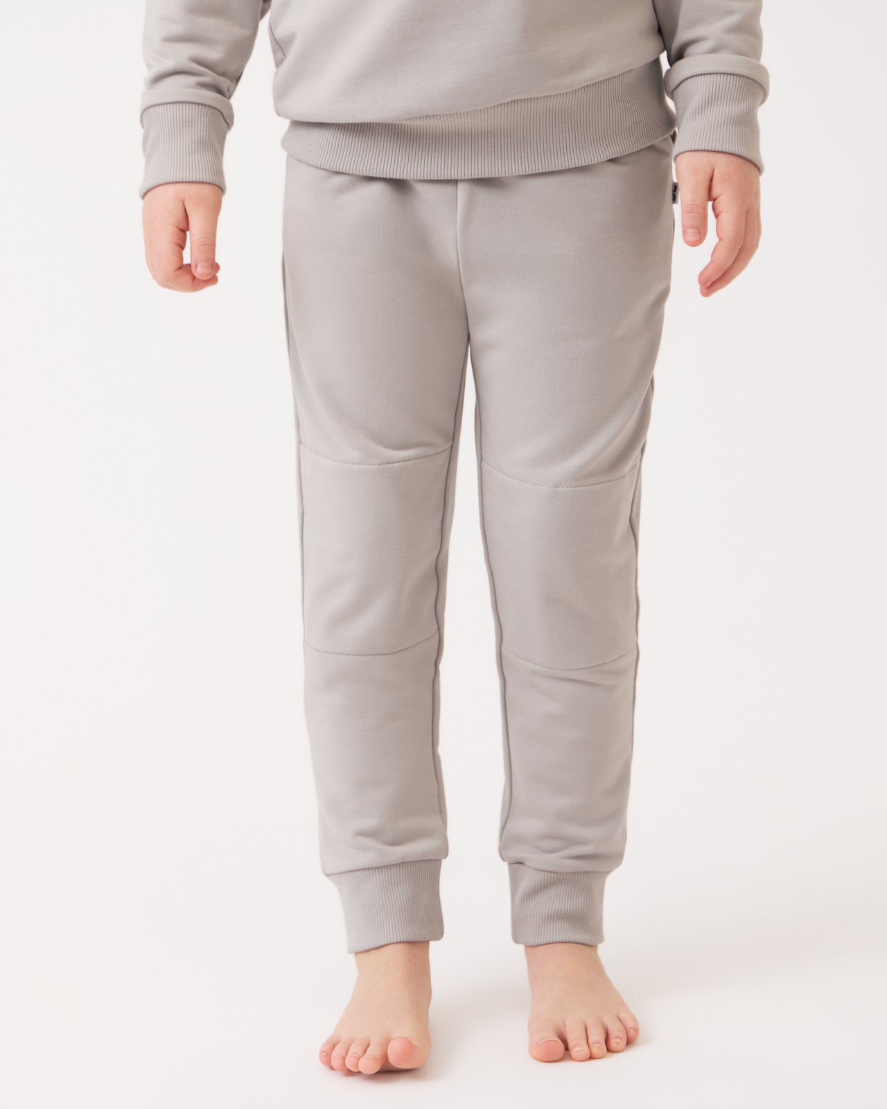Close up of child wearing the Dove Gray Jogger