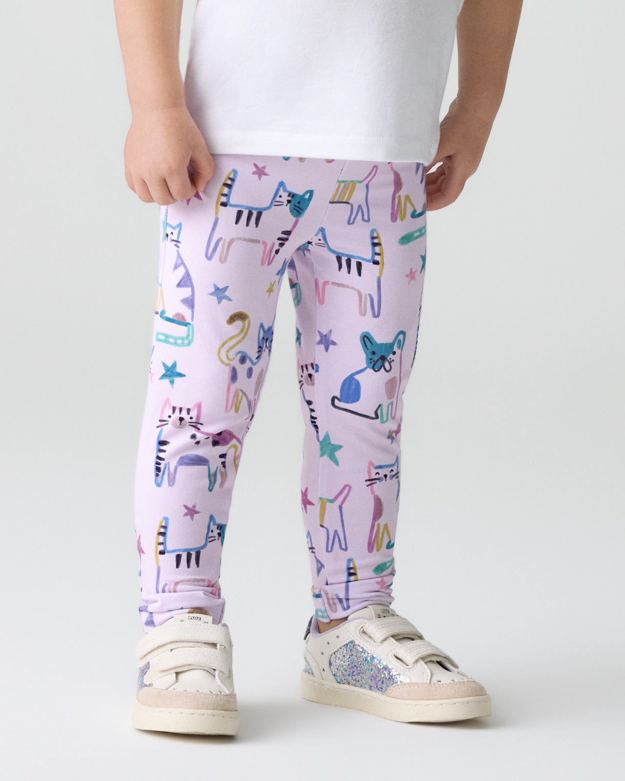 Close up of girl wearing the Whiskers & Wags Purple Legging