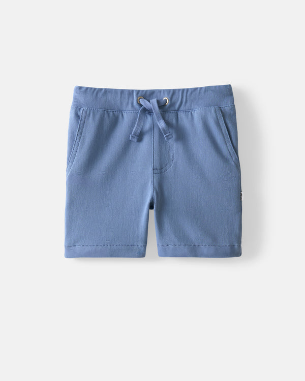 Flat lay of the Infinite Blue Chino Shorts