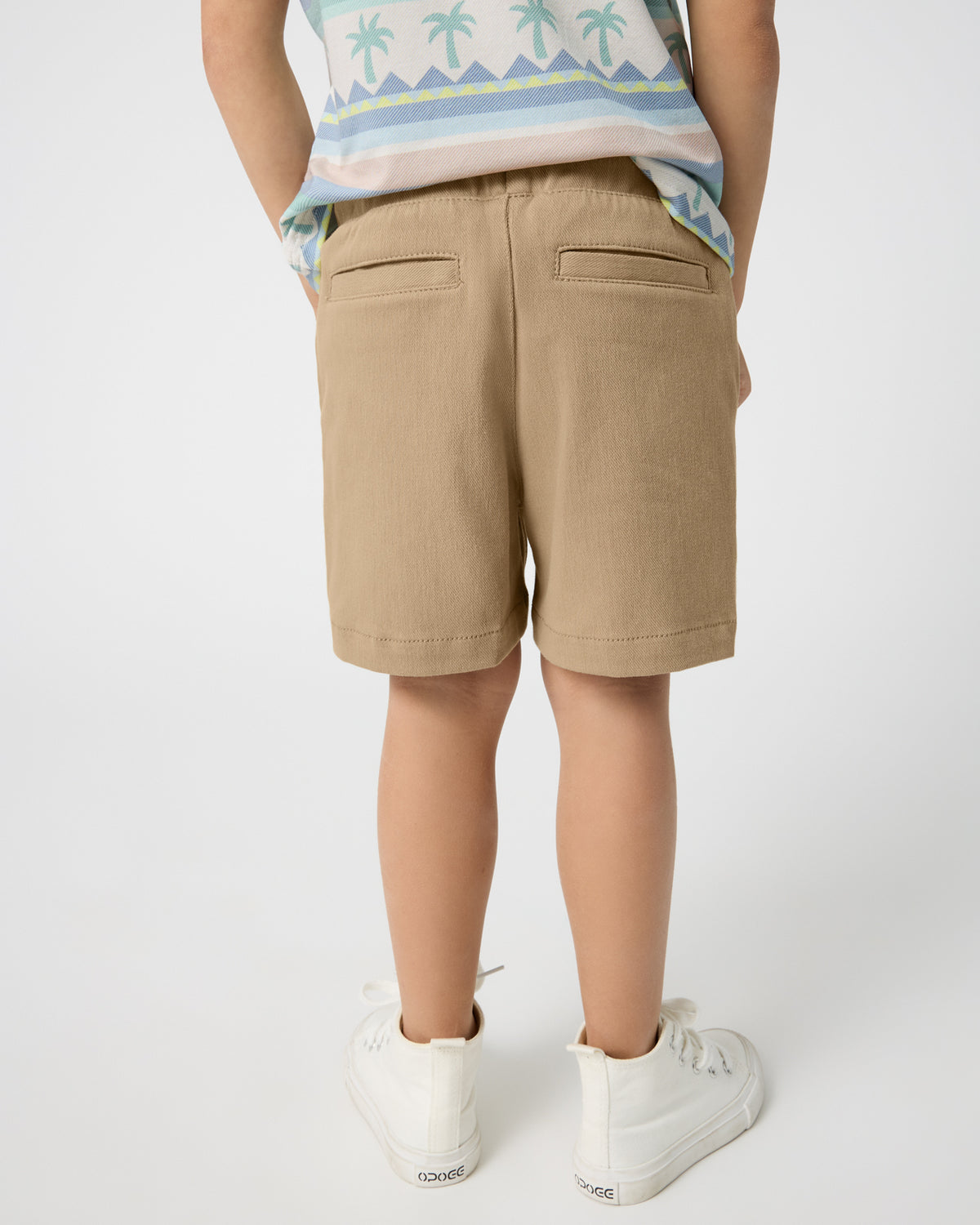 Back view of boy wearing the Toasted Hazelnut Chino Shorts
