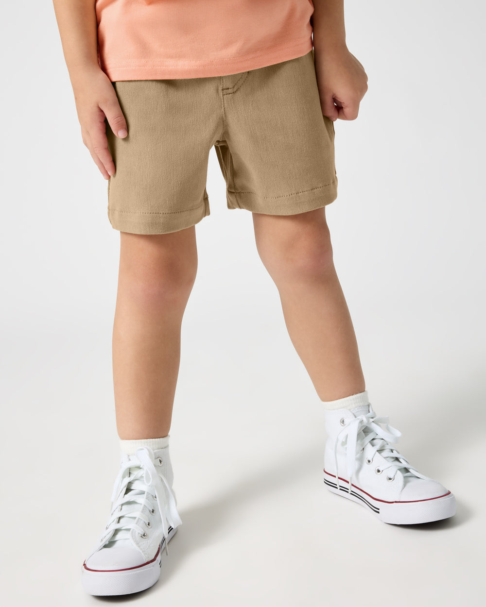 Front view of boy wearing the Toasted Hazelnut Chino Shorts