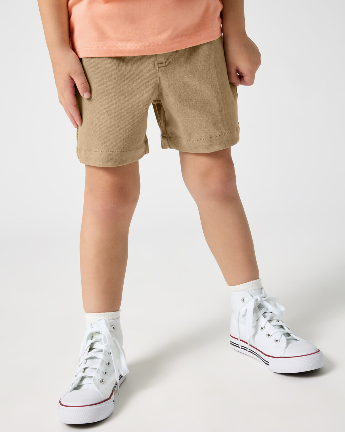 Front view of boy wearing the Toasted Hazelnut Chino Shorts