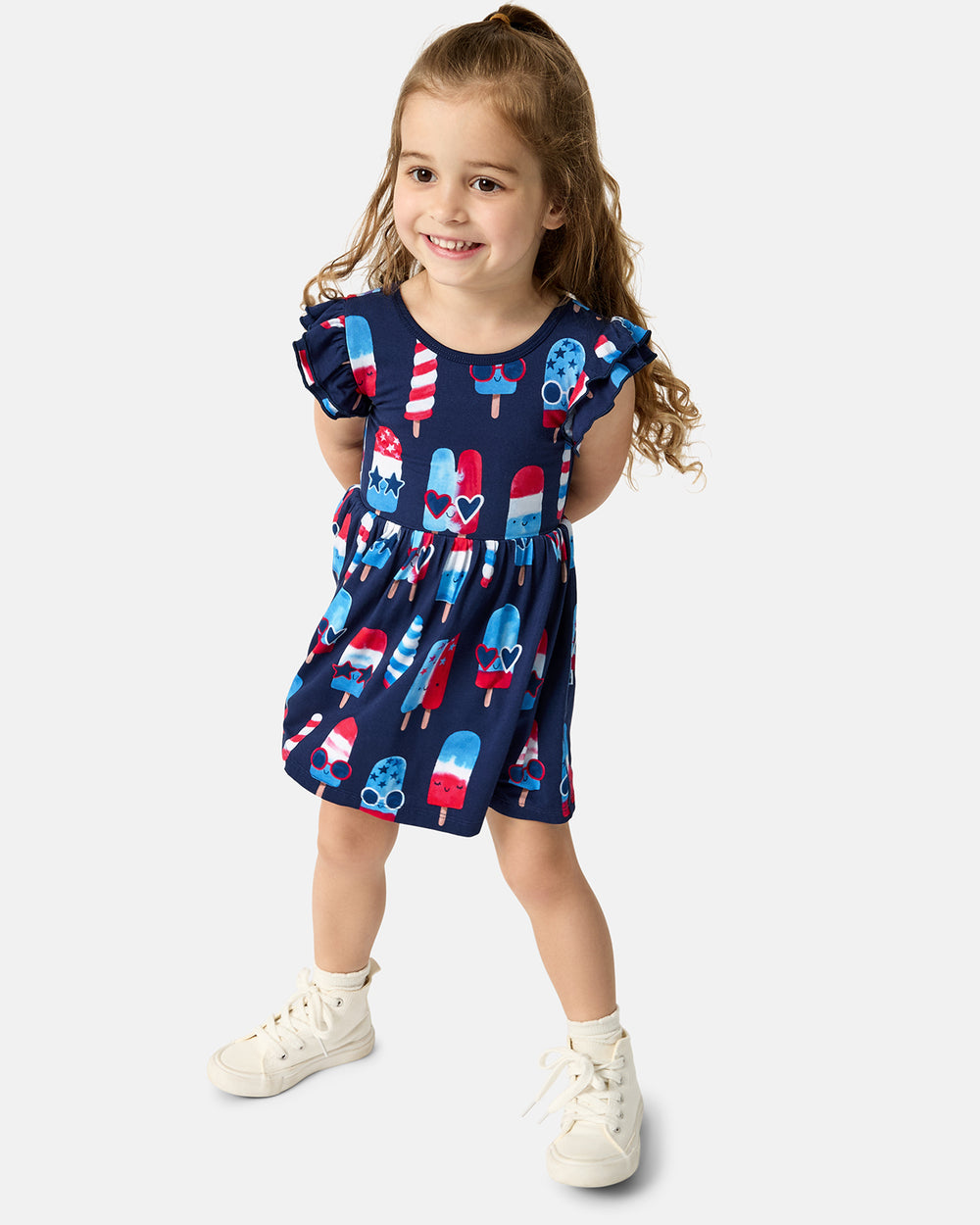 Girl wearing the Sparkle Treats Flutter Skater Dress