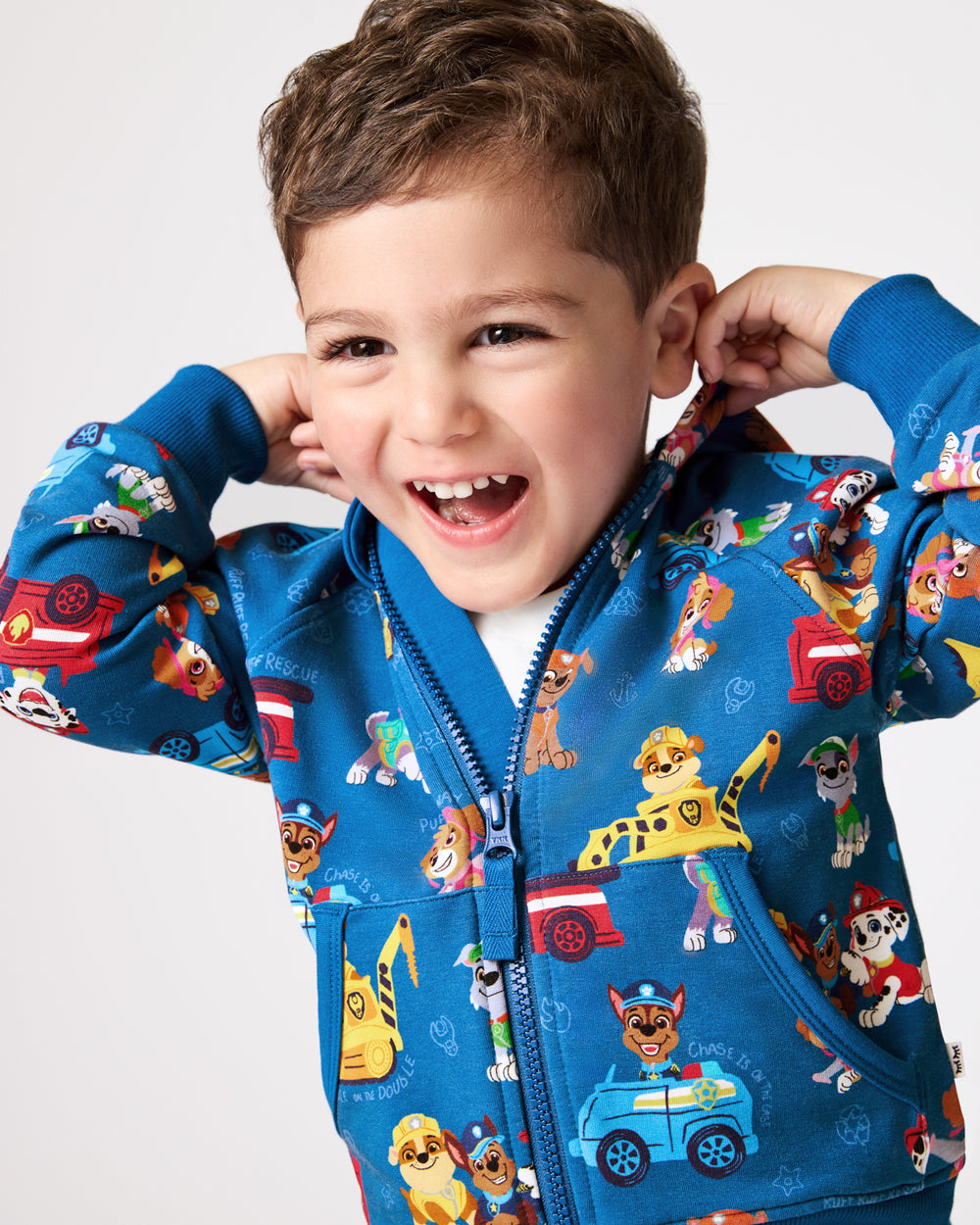 Close up of boy wearing the PAW Patrol Adventure Bay Heroes Zip Hoodie