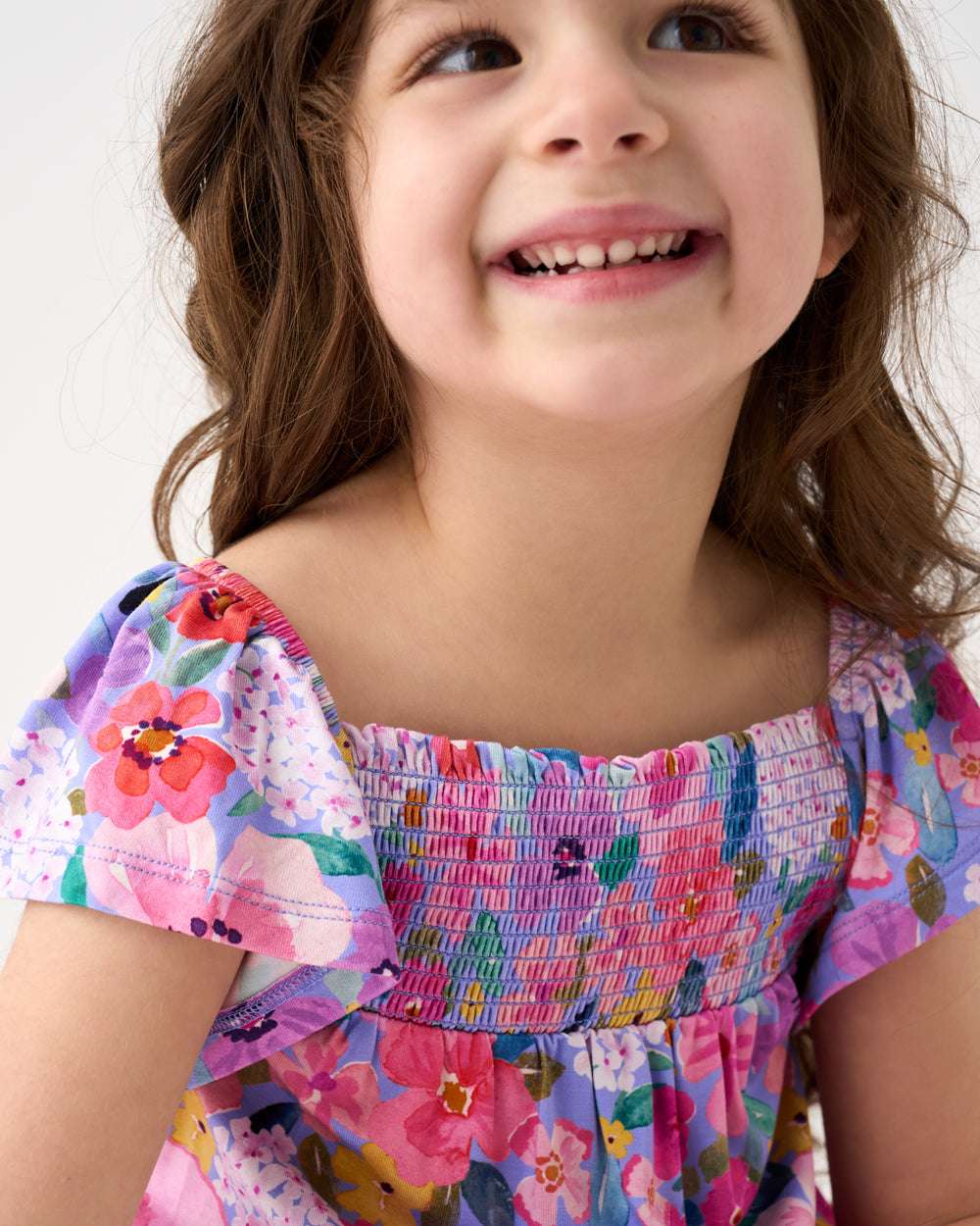 Close up of the smocked detail on the Sweet Sprigs Smocked Flutter Top