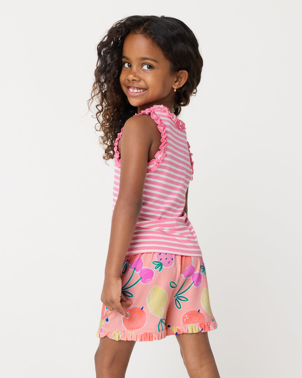 Back view of child wearing the Sweet Pink Stripe Ruffle Tank