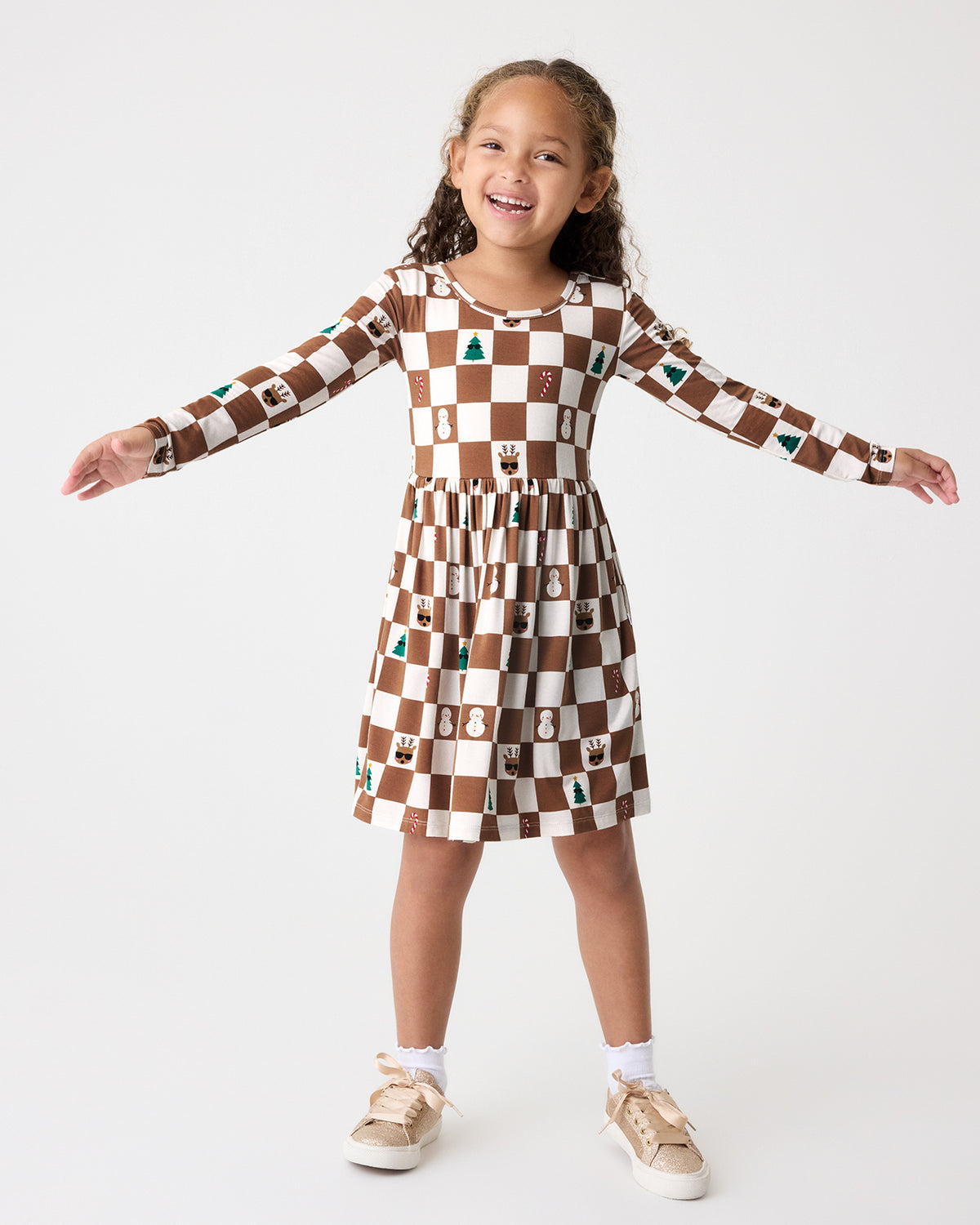 Girl wearing the Holiday Checks Skater Dress