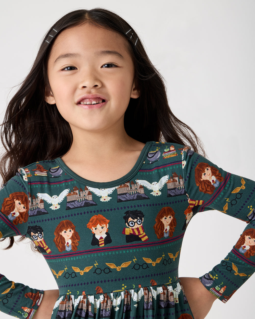 Close up of girl wearing the Harry Potter™ Spellbinding Studies Skater Dress