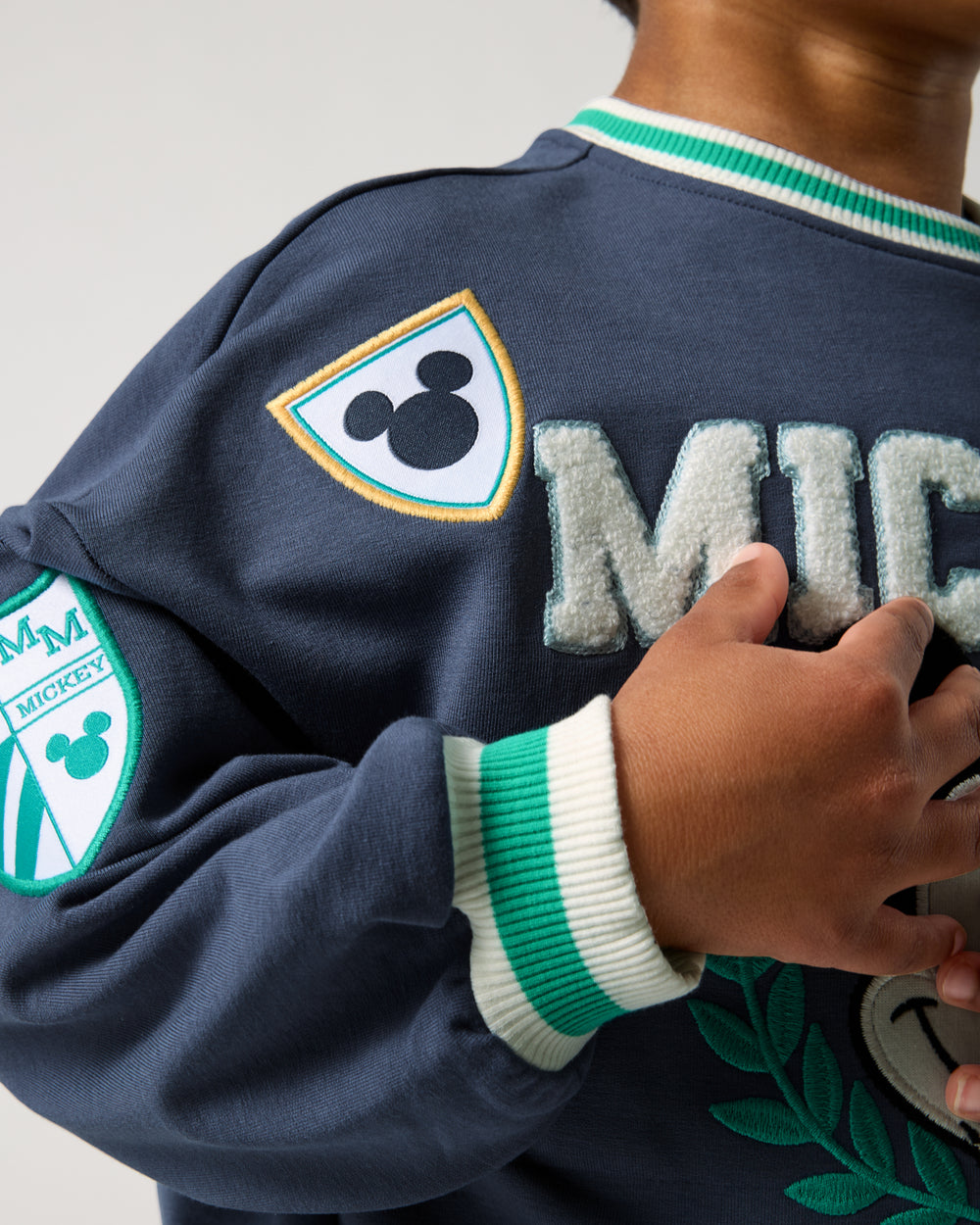 Close up of the wrist cuff on the Disney Mickey Mouse Sports Club Drop Shoulder Crewneck