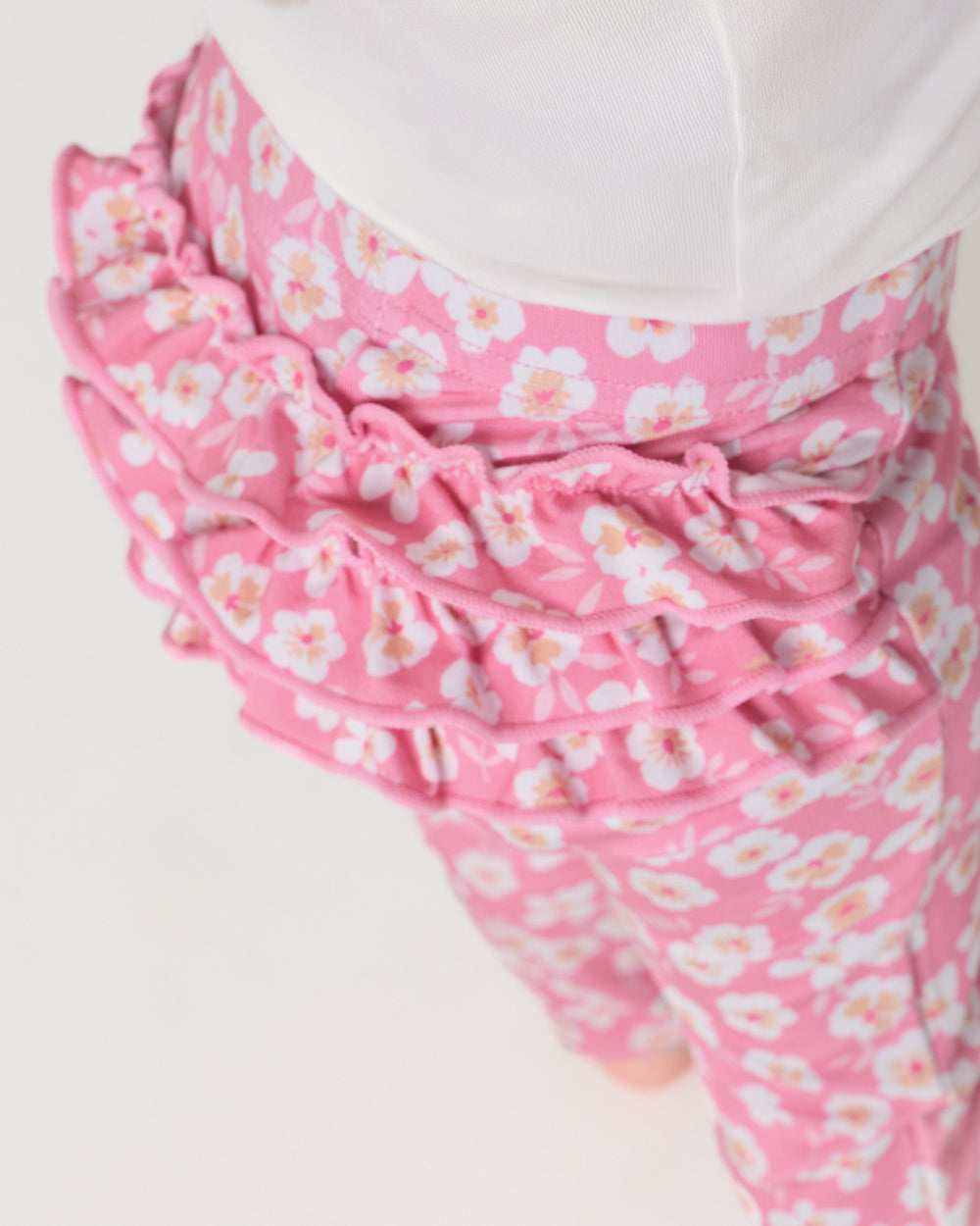 Close up of the ruffle detail on the Sweet Pink Petals Ruffle Legging