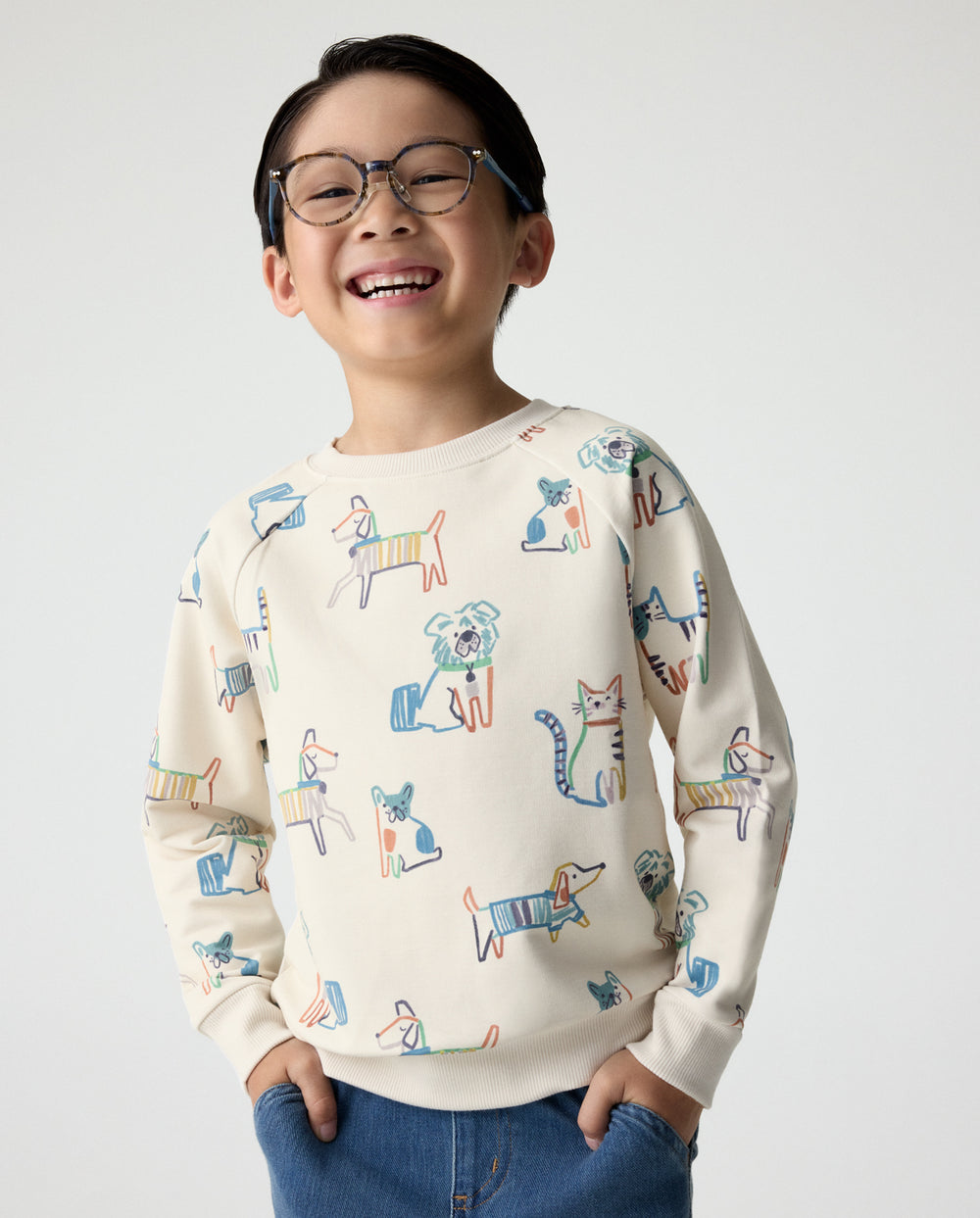 Child wearing the Whiskers & Wags Crewneck Sweatshirt