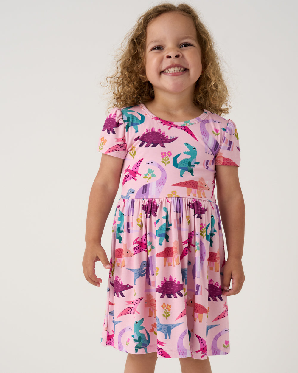 Close up of girl wearing the Roar & Explore Skater Dress