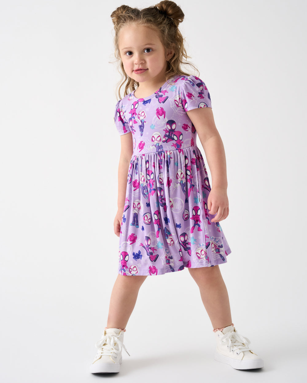 Girl wearing the Spidey & Friends Tiny Webs Skater Dress and white sneakers
