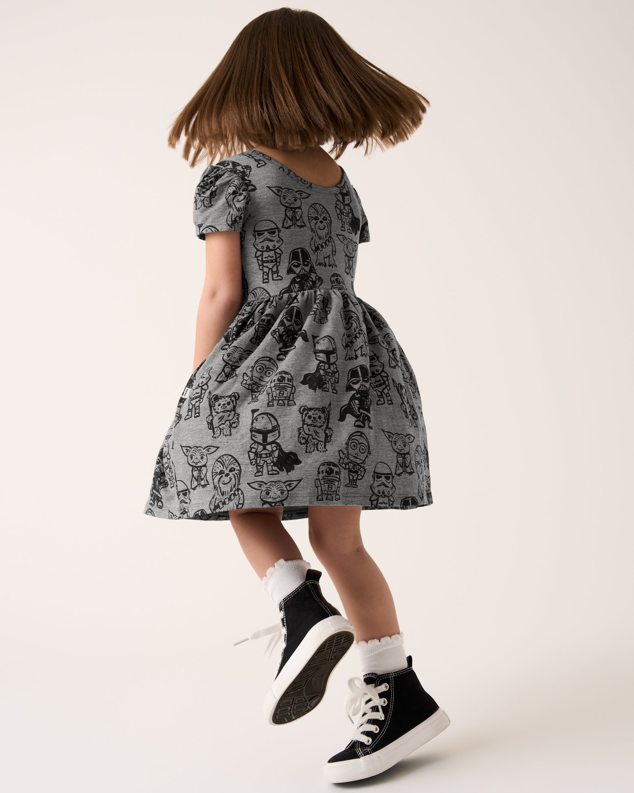 Child in motion wearing the Star Wars Far, Far, Away Friends Skater Dress