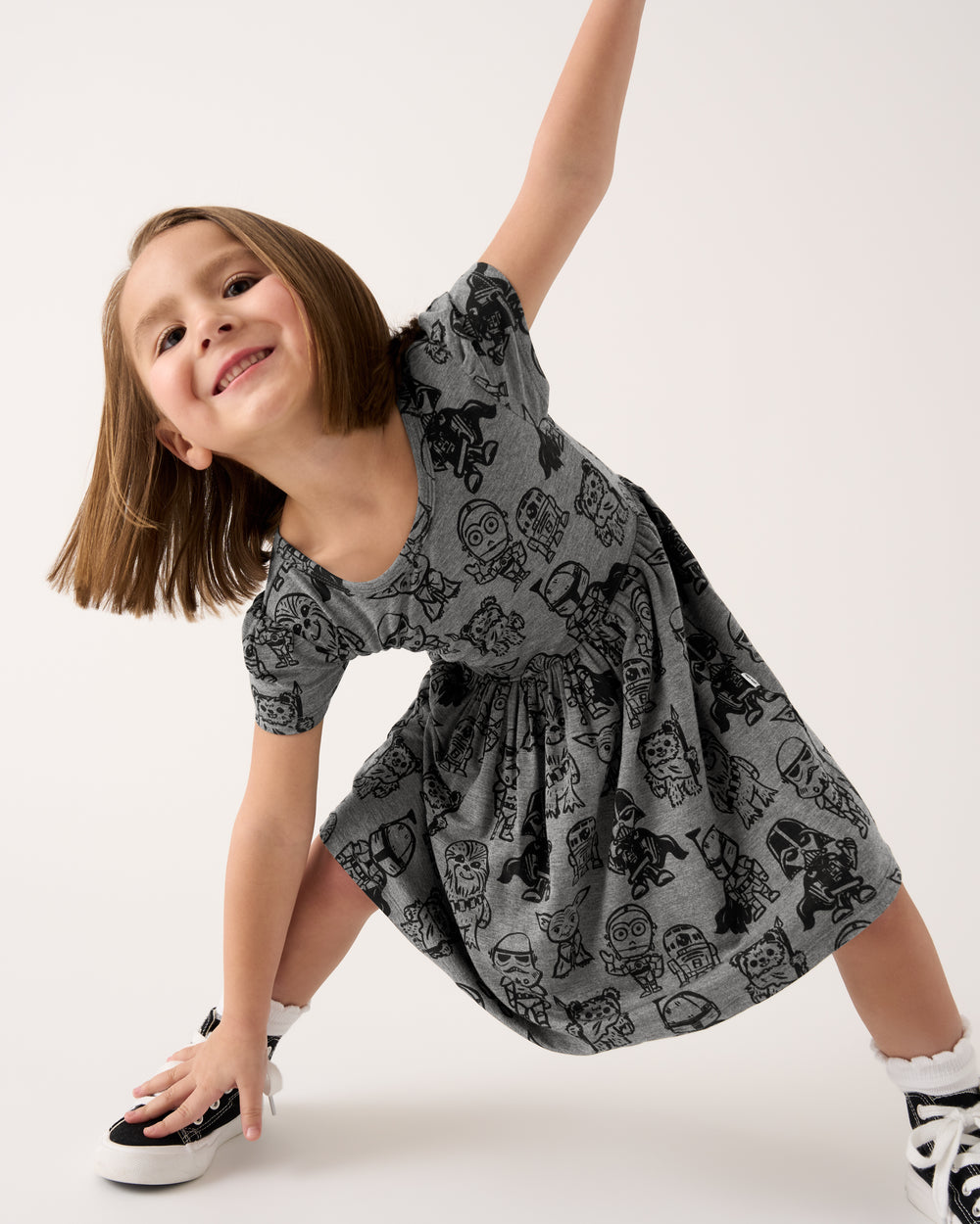 Posing girl wearing the Star Wars Far, Far, Away Friends Skater Dress