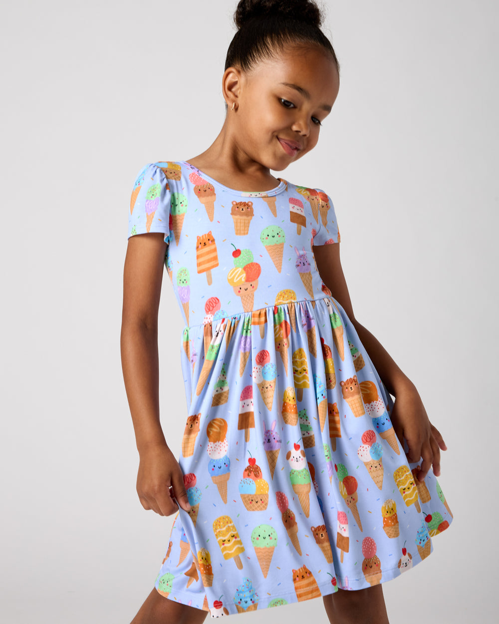 Close up of girl wearing the Scoop Squad Skater Dress