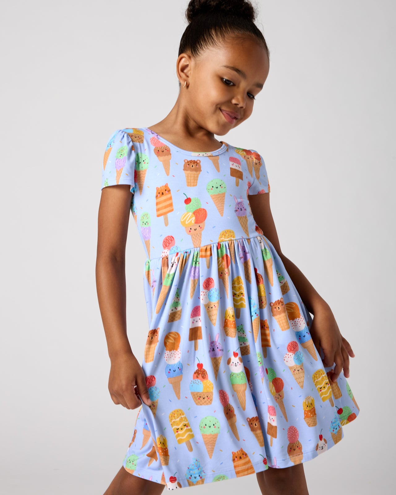 Close up of girl wearing the Scoop Squad Skater Dress
