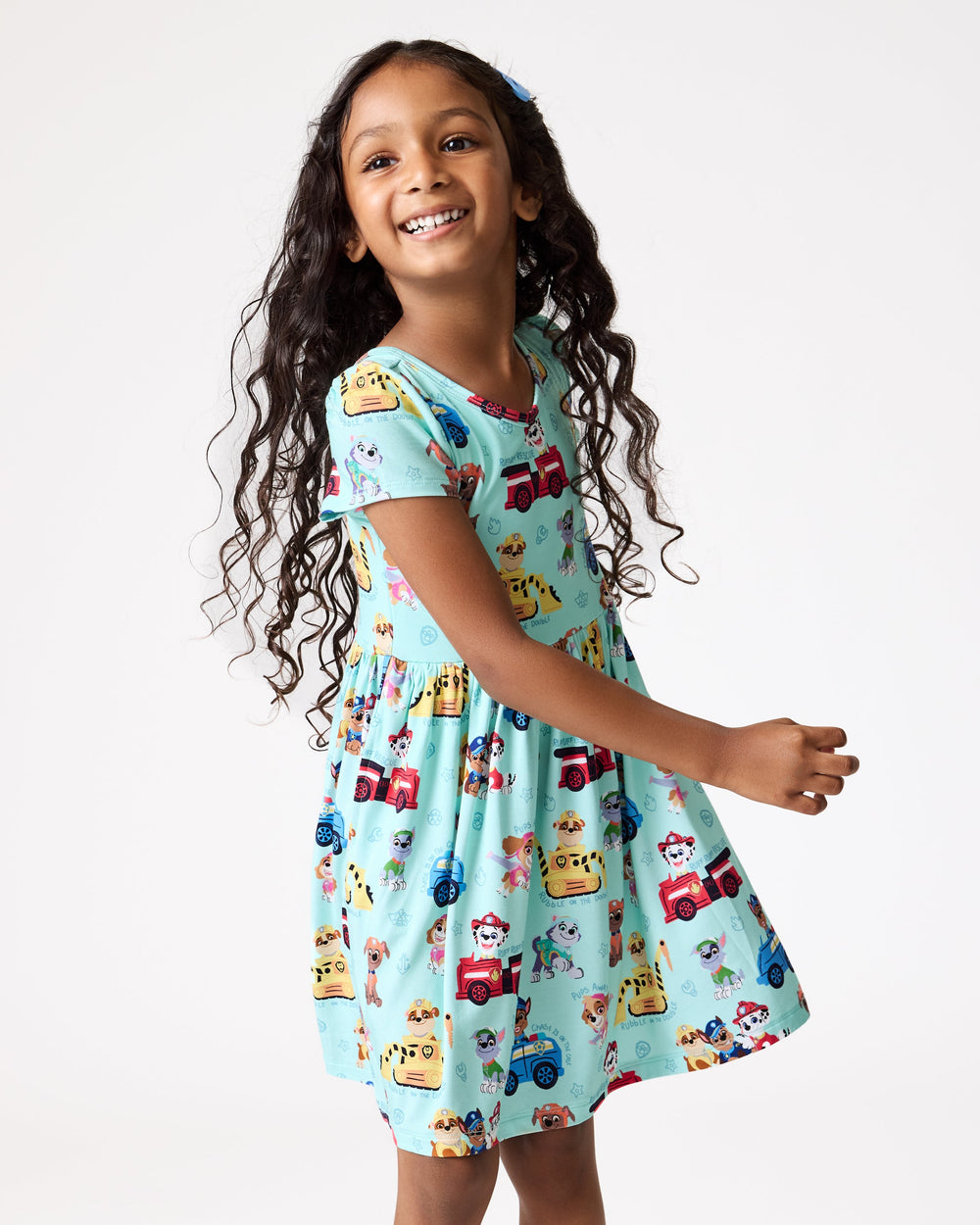 Girl wearing the PAW Patrol Adventure Bay Heroes Skater Dress