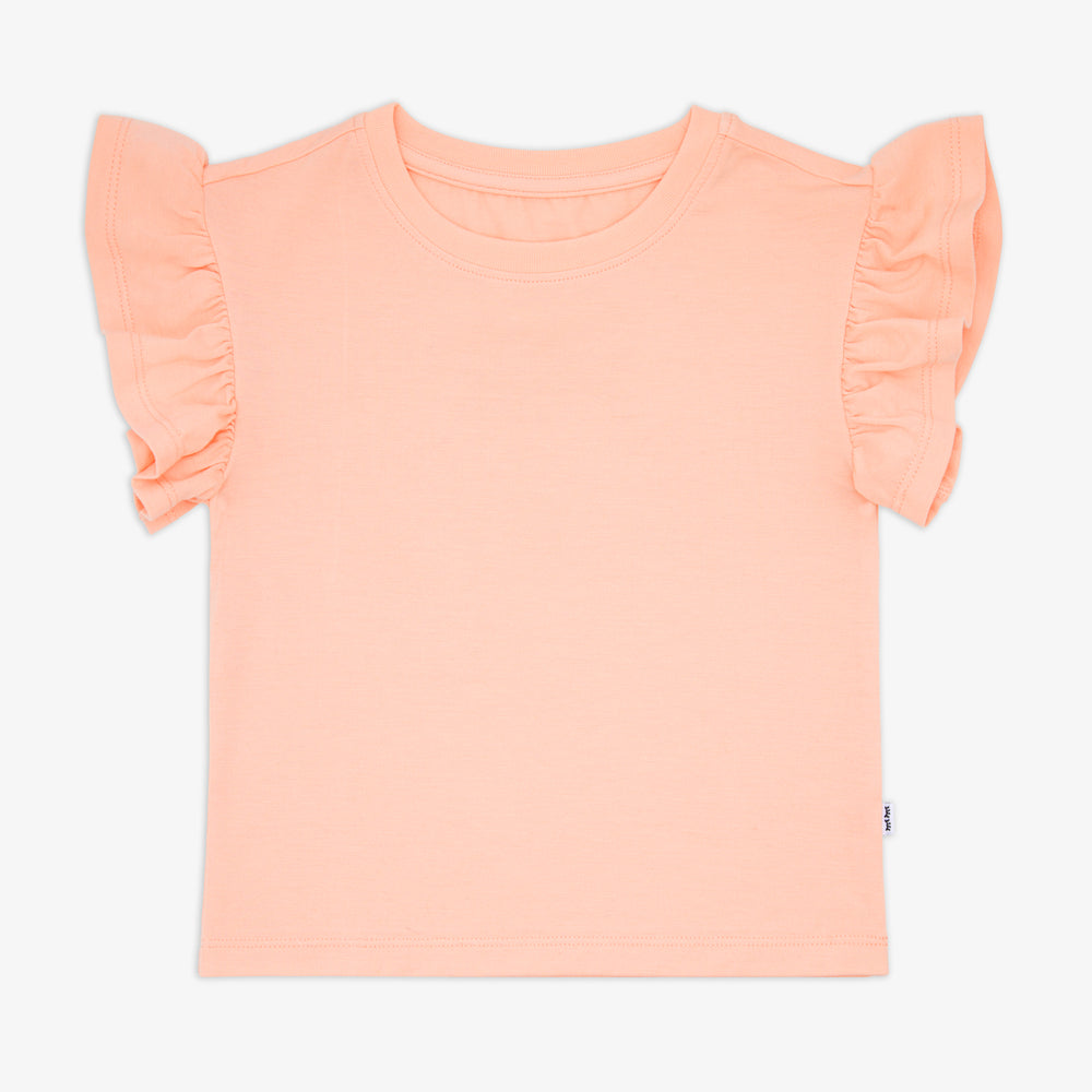 Flat lay of the Peach Sorbet Ruffle Tee