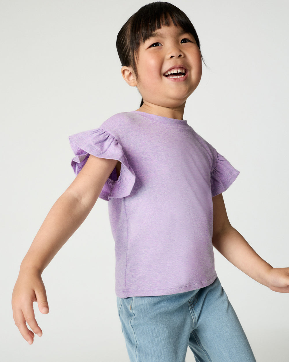 Girl wearing the Heather Lavender Flutter Tee