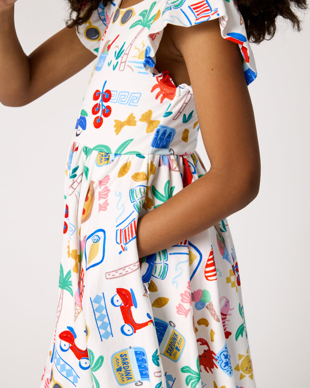 Close up of the pocket detail on the Ciao Bella Flutter Twirl Dress