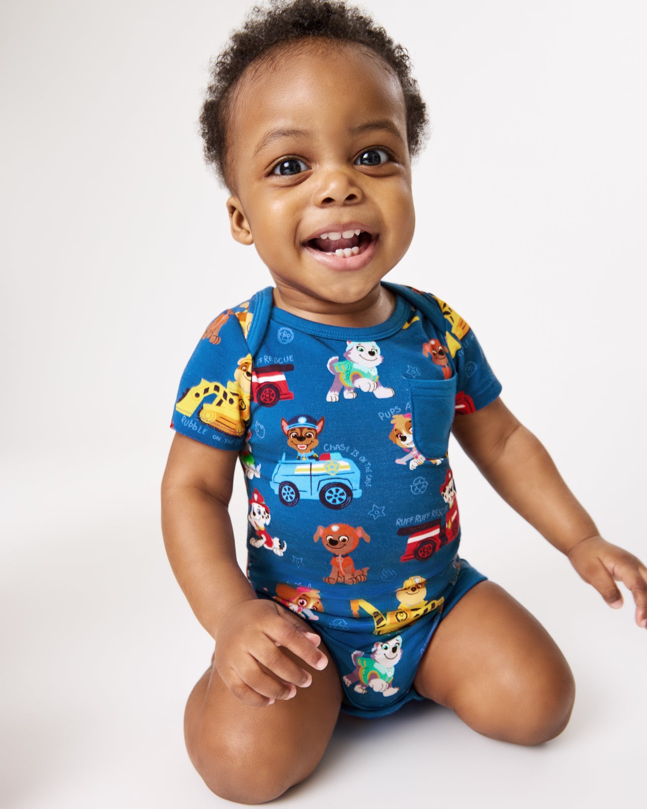 Baby wearing the PAW Patrol Adventure Bay Heroes Pocket Bodysuit
