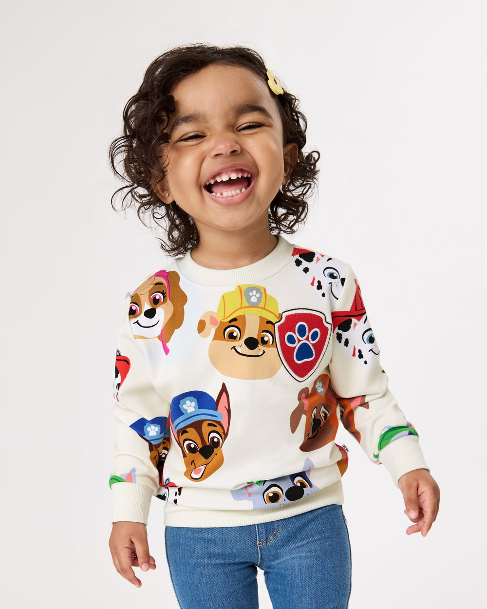 Standing girl wearing the PAW Patrol Rescue Ready Crewneck Sweatshirt 