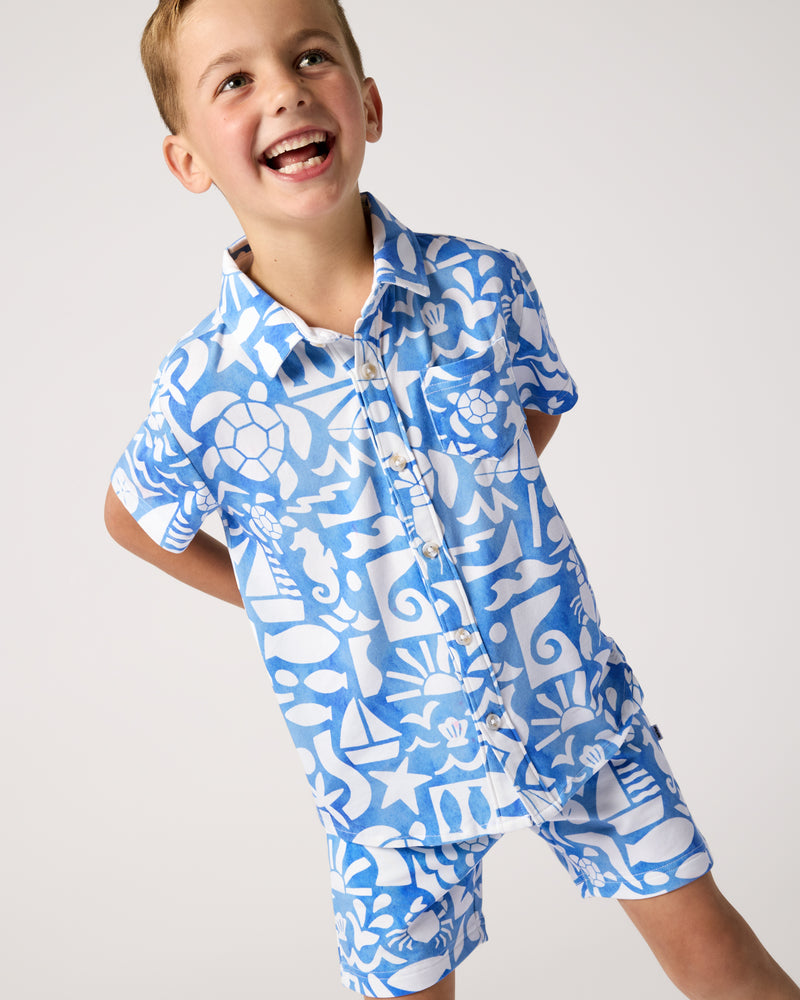Boy wearing the Summer Shores Button Down Polo and Shorts