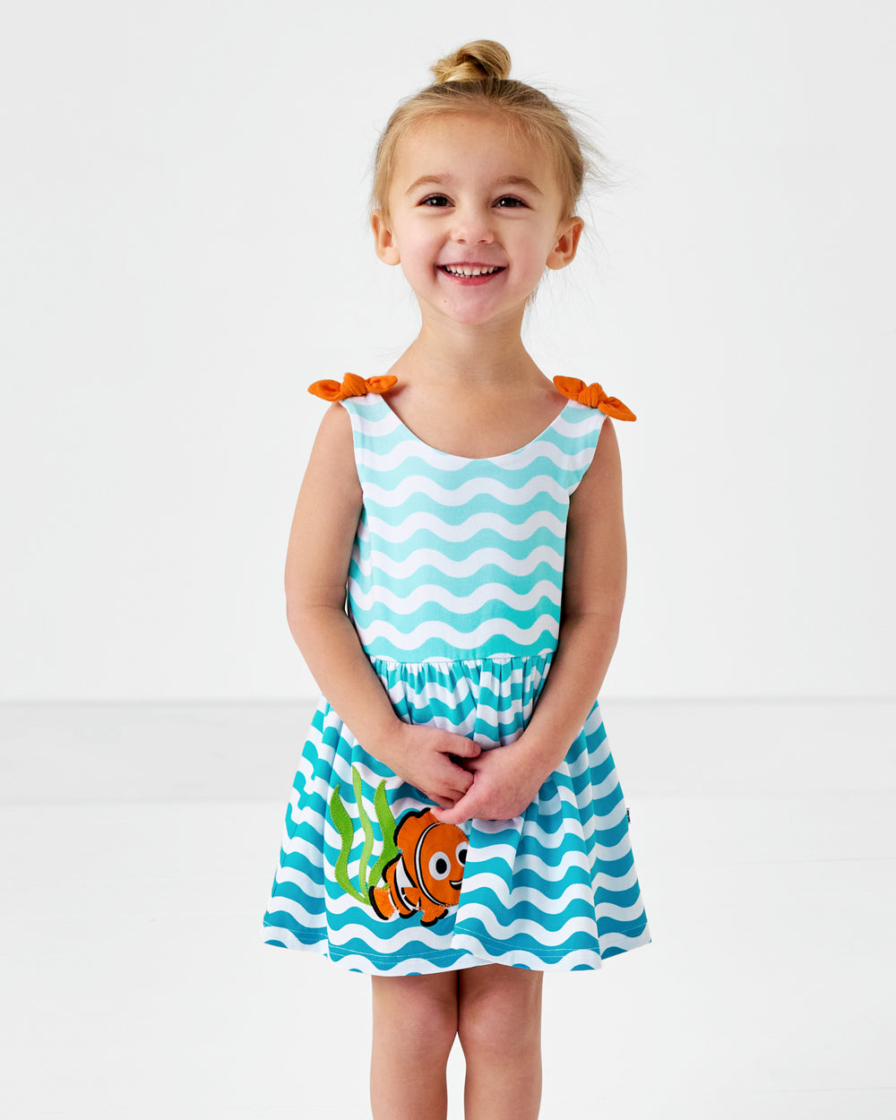 Child wearing the Disney Nemo Skater Dress with Bodysuit