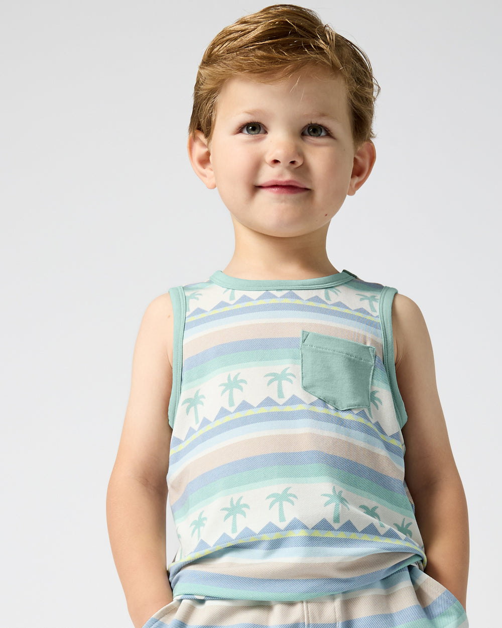 Close up of child wearing the Swell Stripes Pocket Tank Top
