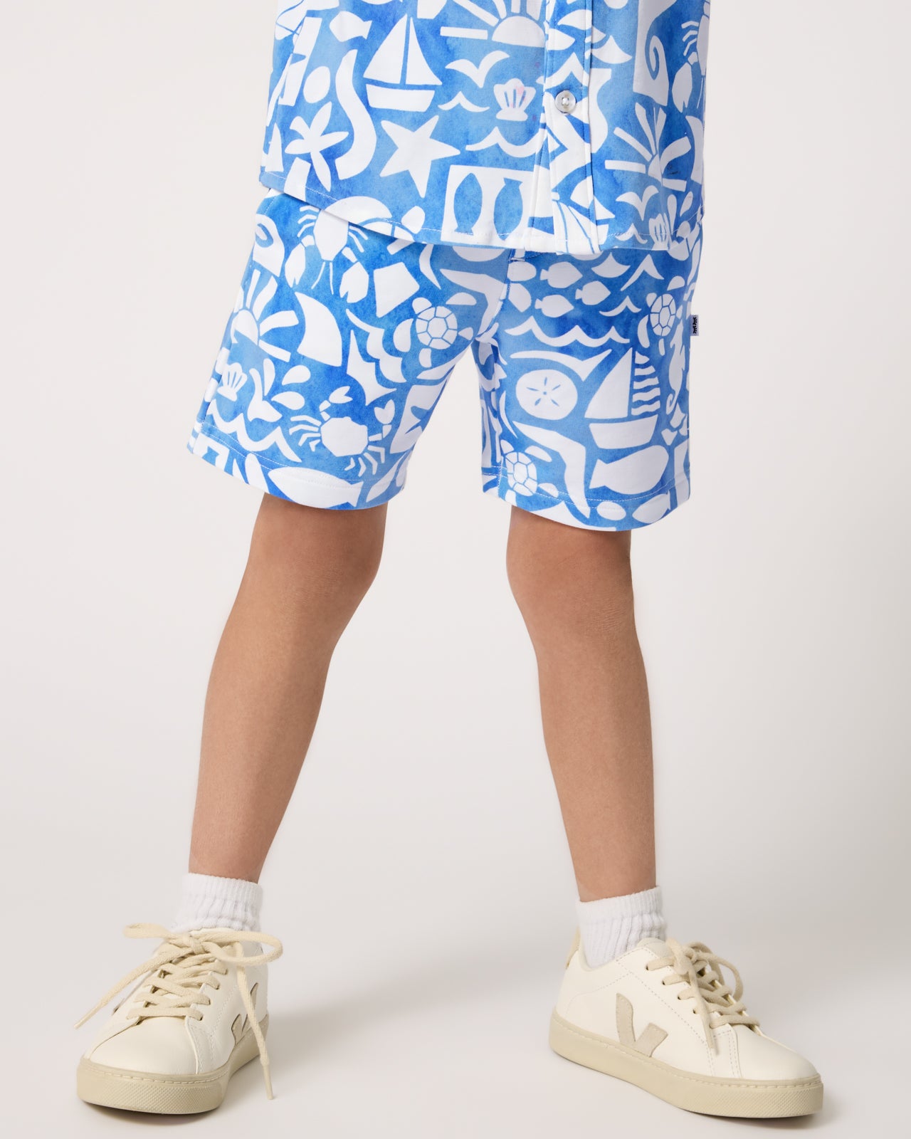 Close up of boy wearing the Summer Shores Drawstring Shorts