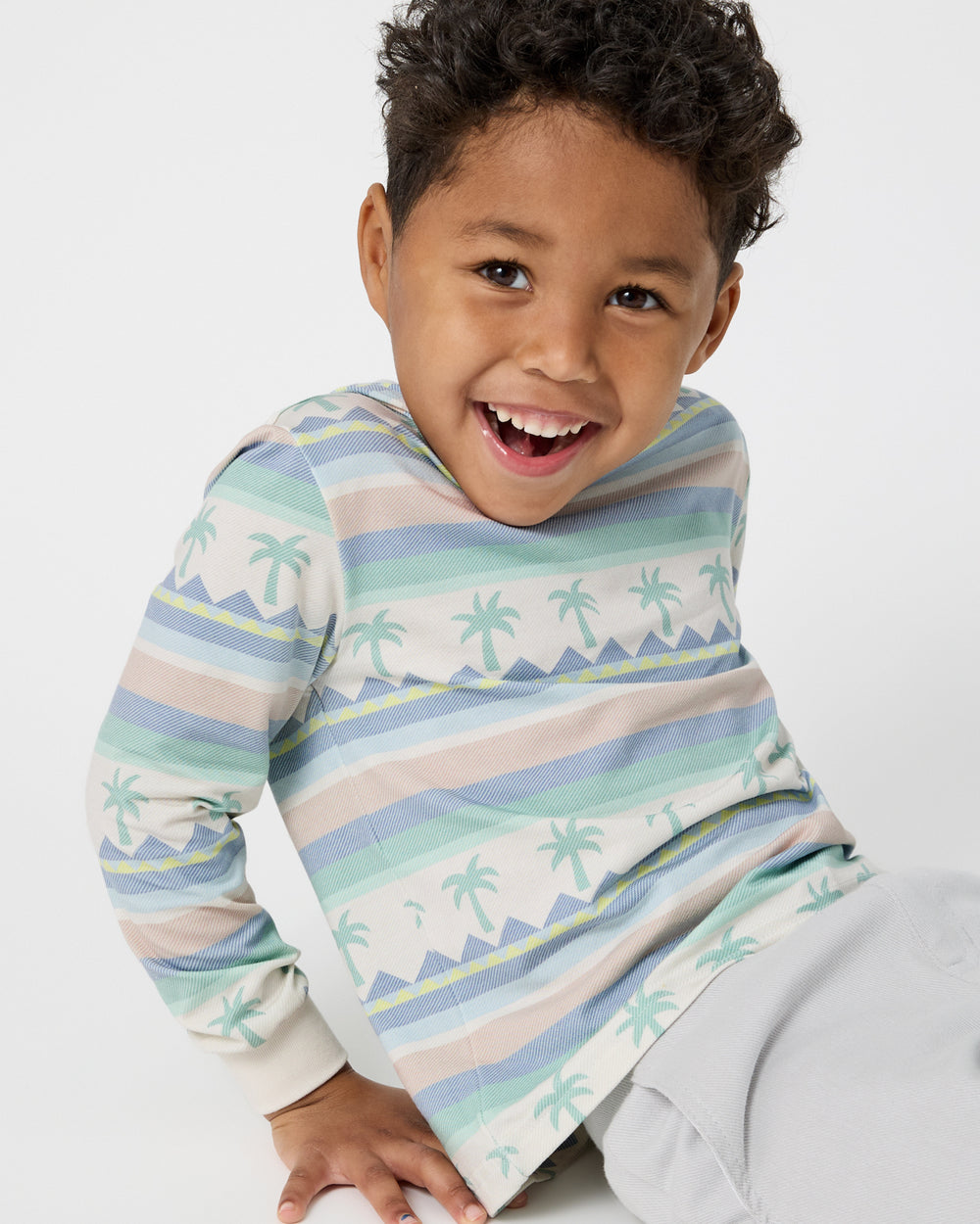Close up of boy wearing the Swell Stripes Hooded Tee