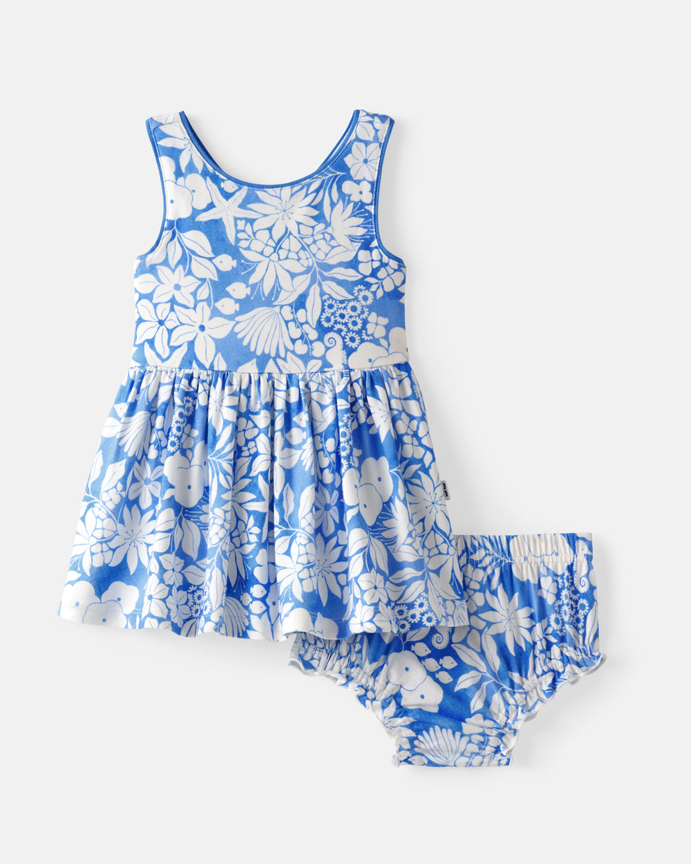 Flat lay of the Azure Garden Cross Back Skater Dress with Bloomer