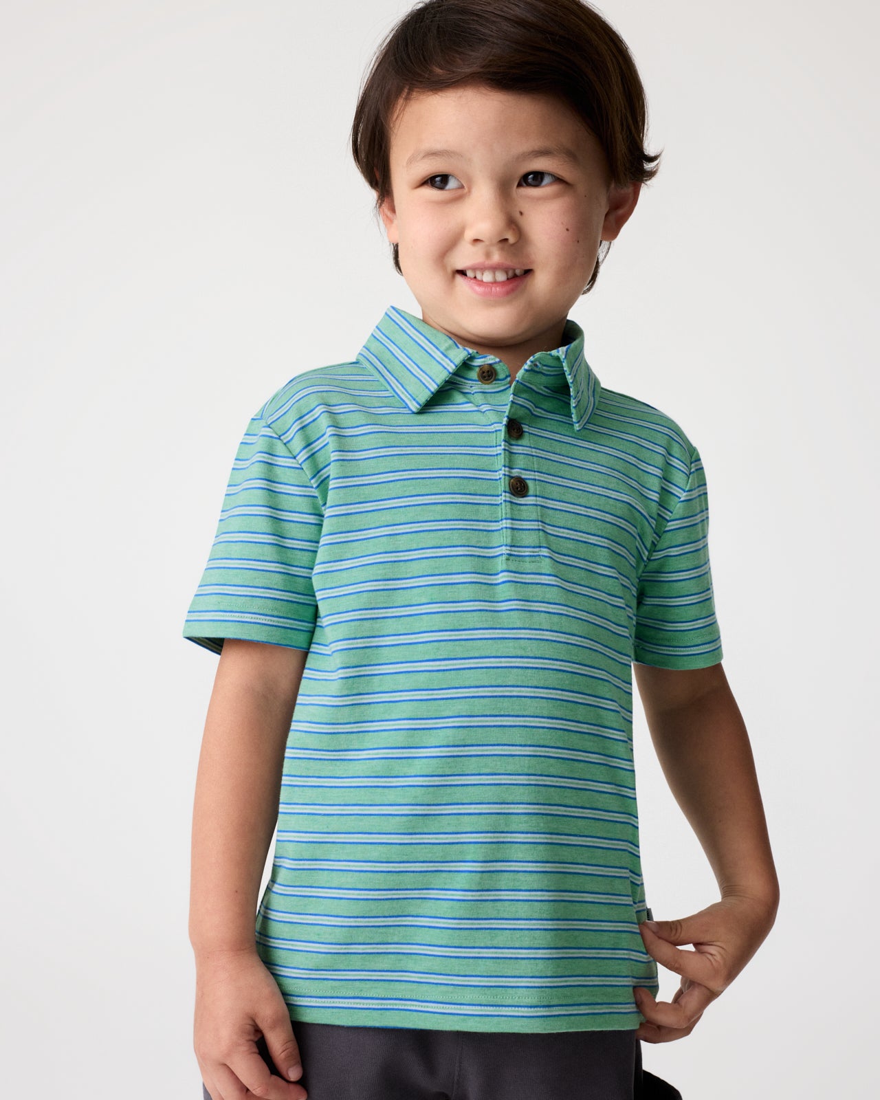 Boy wearing the Fresh Green Heather Stripes Polo Shirt