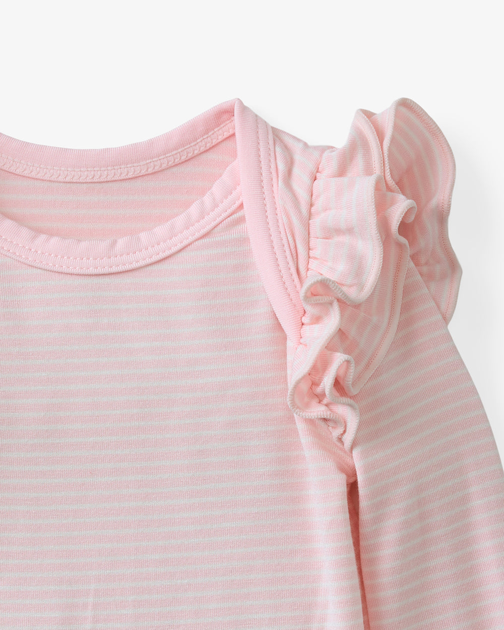 Close up flat lay of the flutter shoulder on the Prima Pink Stripe Flutter Bodysuit