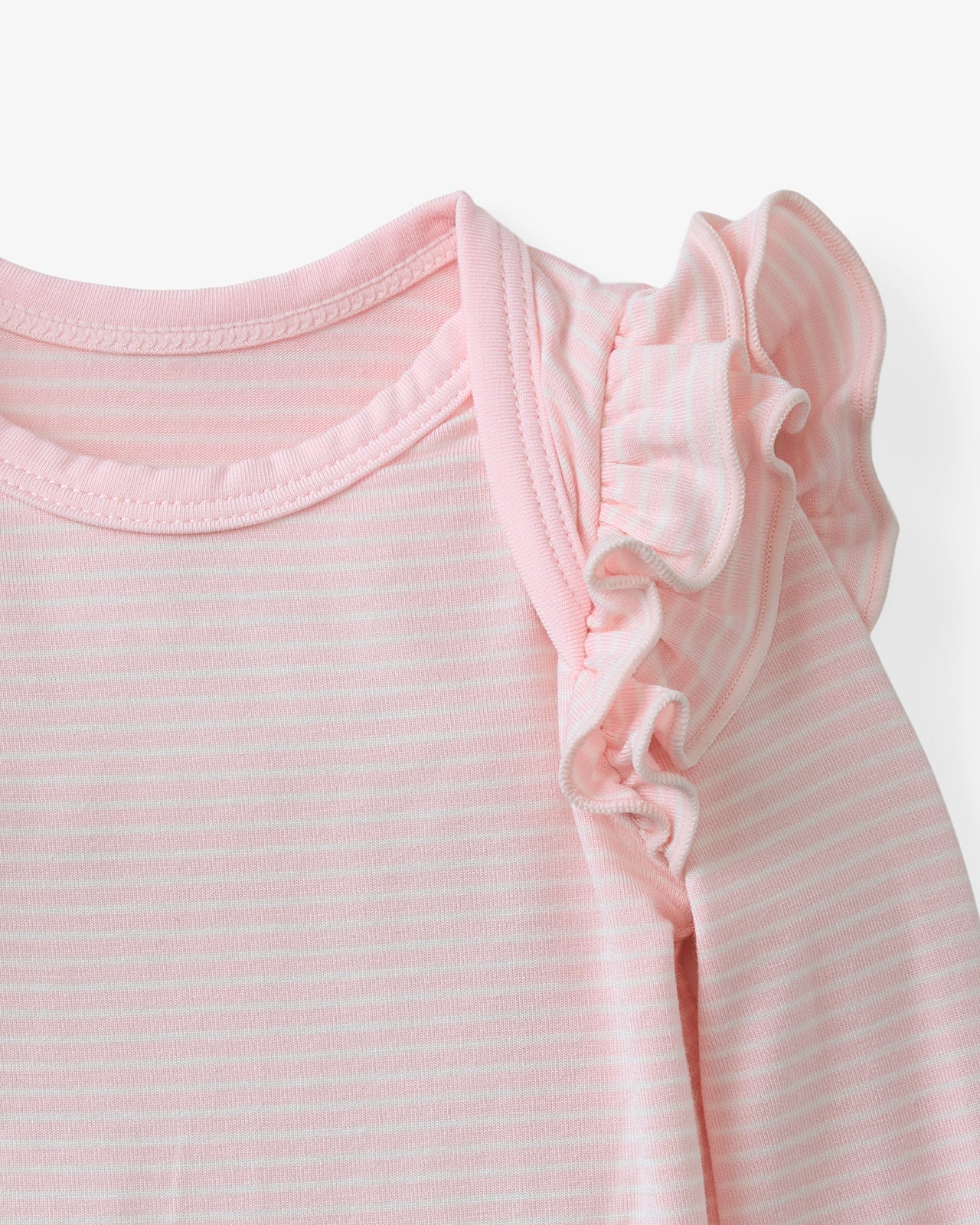 Close up flat lay of the flutter shoulder on the Prima Pink Stripe Flutter Bodysuit