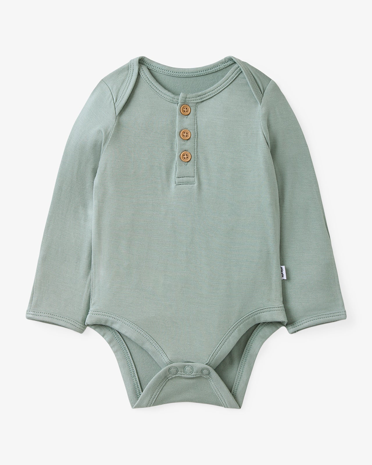 Flat lay of the Willow Henley Bodysuit