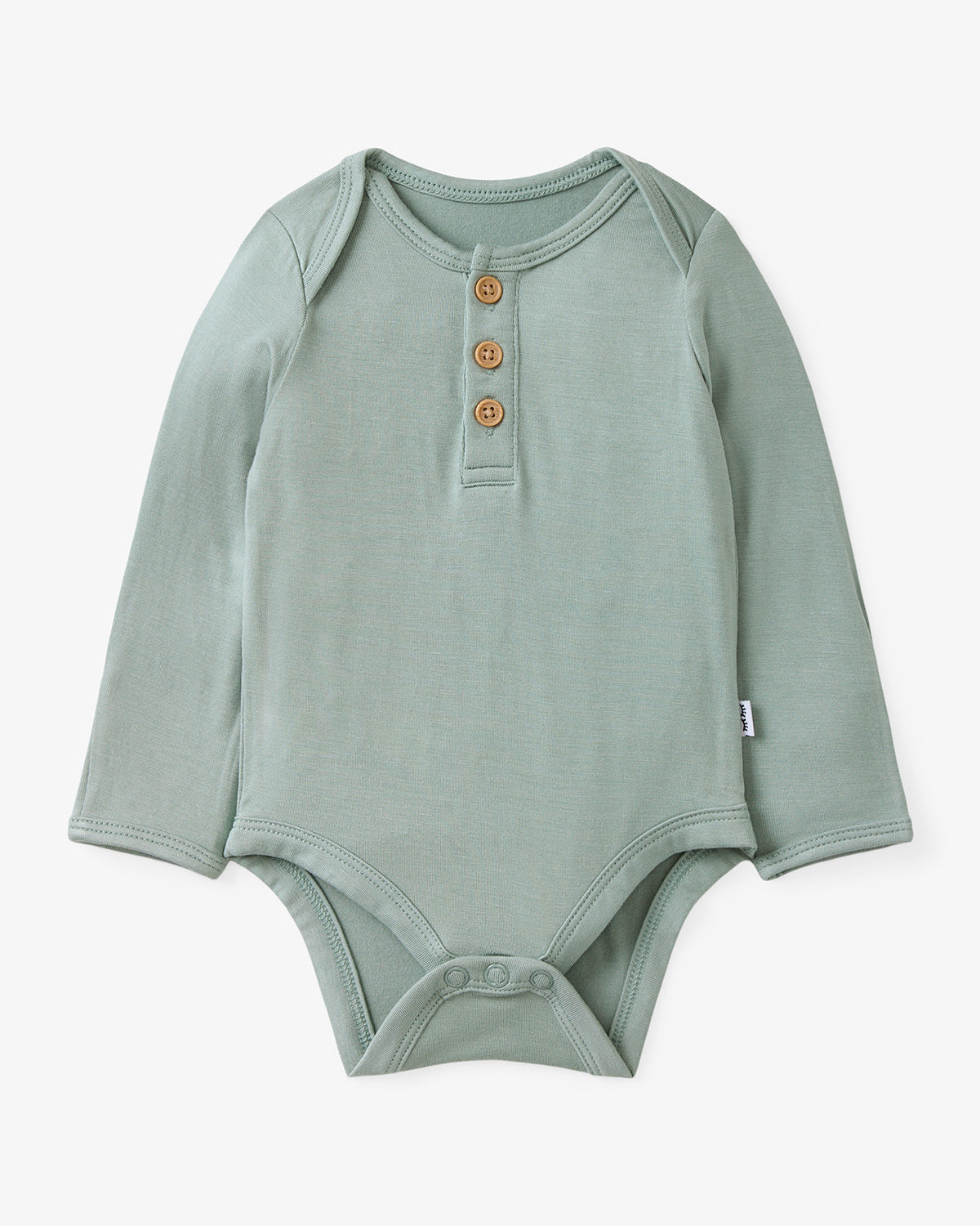Flat lay of the Willow Henley Bodysuit