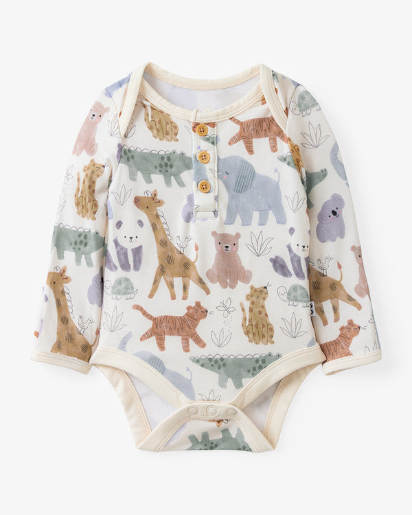 Flat lay of the Sweet Safari Henley Bodysuit