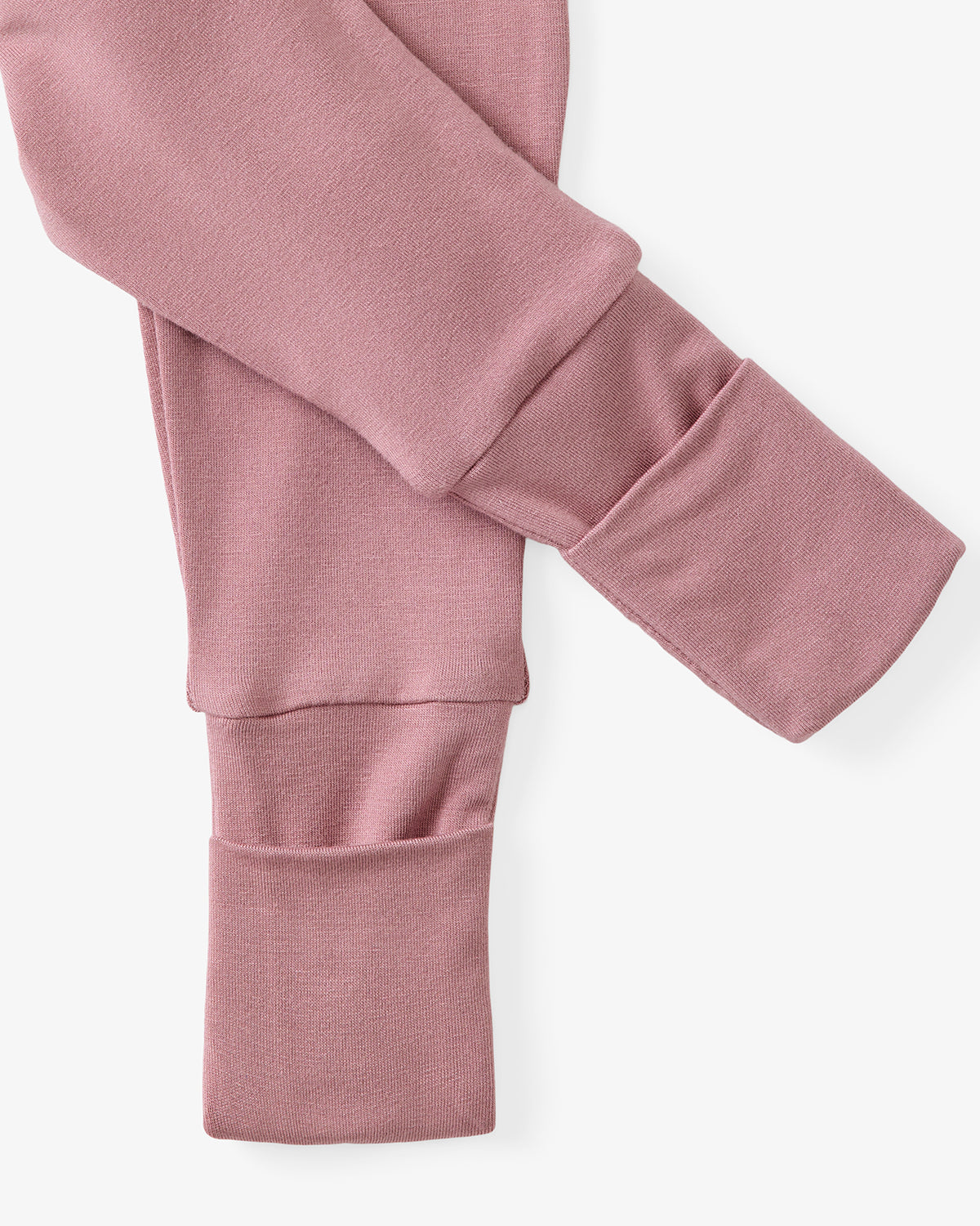 Close up flat lay of foot fold over detail on the Rosewood Fold-Over Legging