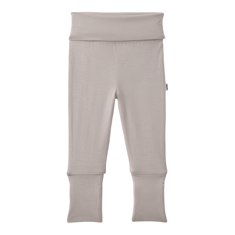 Beige baby leggings on a white background